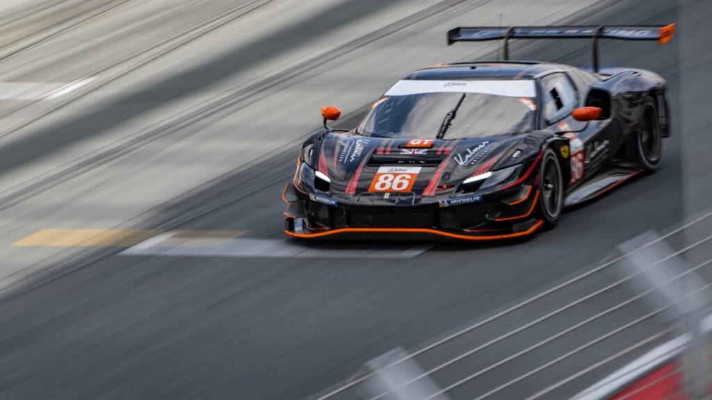 a race car driving down a race track